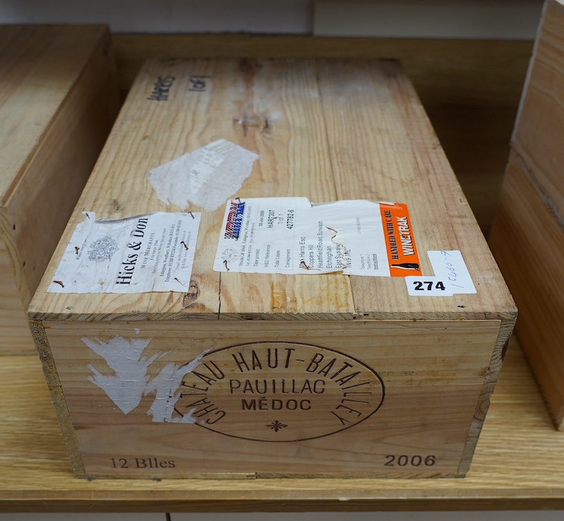 A sealed case of twelve bottles of Chateau Haut Batailley 2006. Condition - good